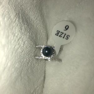 VP retired brand new dark blue pearl ring.